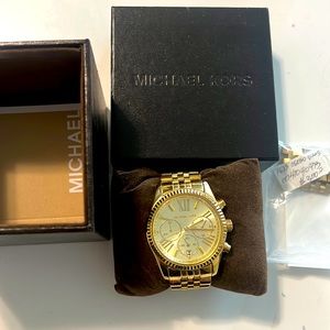 Michael kors watch in gold. Additional original links. Purchased $300.